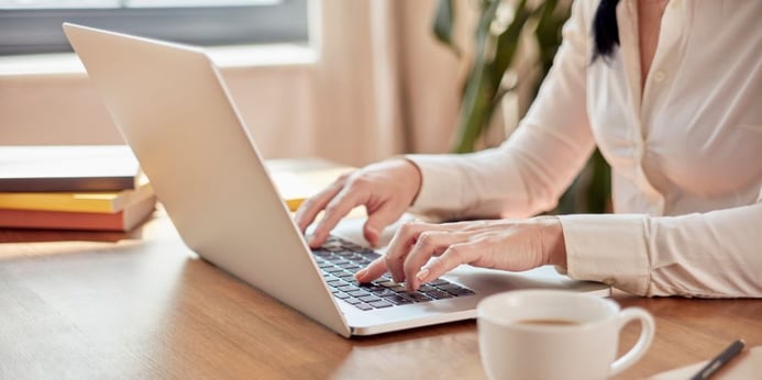 Woman working at a computer