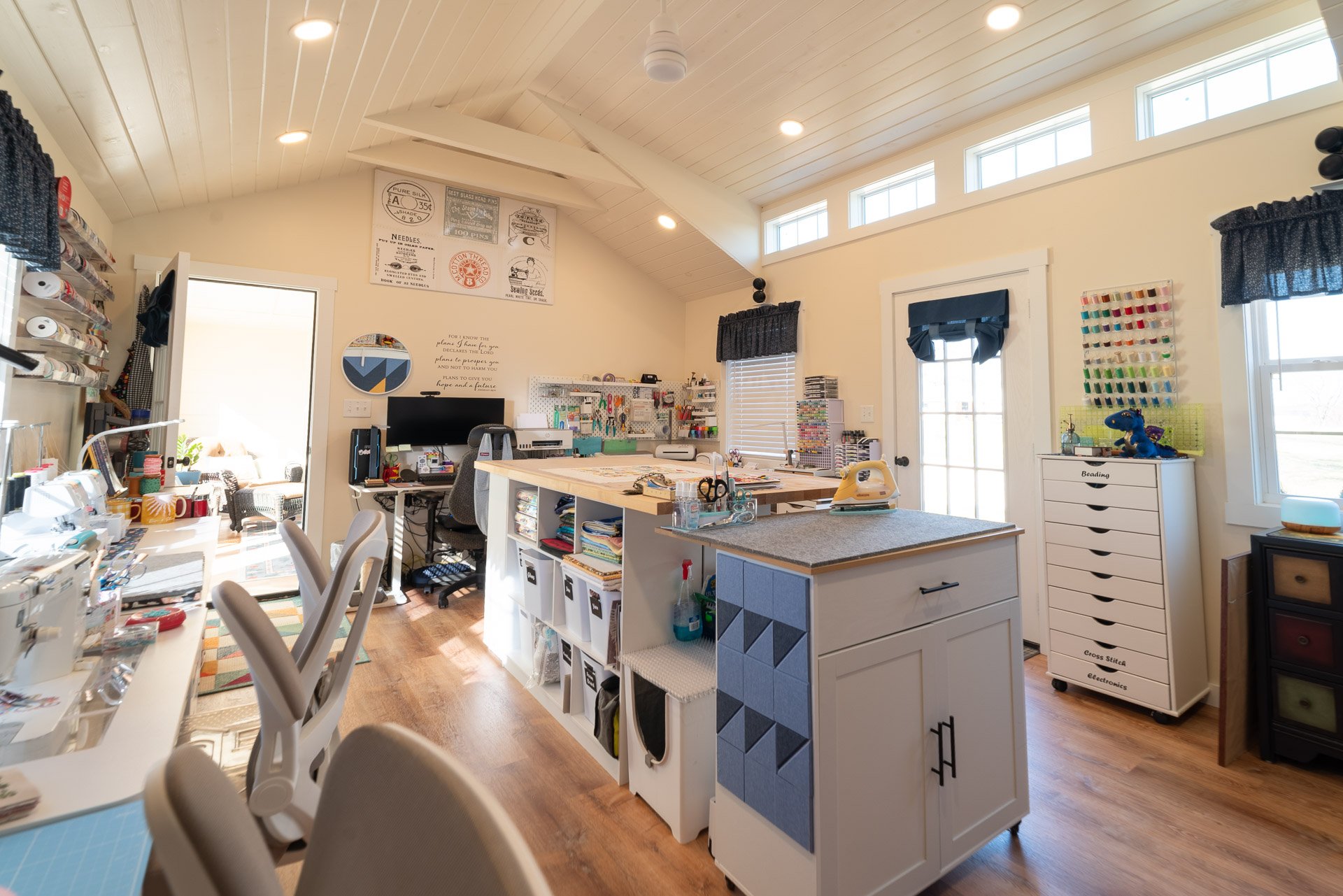 Inside the beautiful 14 by 32 dormer cabin turned into a quilting studio